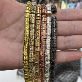 Resim Yaklaşık 70 adet Volkanik Taş Ayracı Boncuk, Her biri 6X3Mm ölçüsünde. 