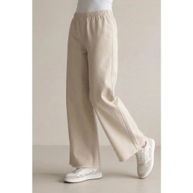 Resim Modestim Kadın Bej Beli Lastik Özel Yıkamalı Kumaş Paçaları Püsküllü Geniş Paça Tesettür Pantolon 