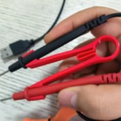 Resim Pratik Multimetre Prob Tutucu, Tek Elle Kullanım Yardımcı Aracı - Ekipmanı/Veri Kaydını Ayarlamak İçin Metre Kablosunu Güvenle Tutan, Yaygın Noktalı Problara Uyumlu Evrensel Tip, Devre Tamir Aksesuarları, Bileşen Test Kabloları 