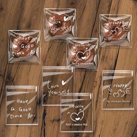 Resim 100 Adet Şeffaf Kalp Şeklinde 4'ü 1 Arada Kendinden Yapışkanlı Hediye Çantaları - İlham Verici Alıntılı, Dayanıklı Plastik Parti Çantaları Doğum Günleri, Düğünler, Tatiller İçin - Yeniden Kullanılabilir Küçük Hediye Paketi, Hediye Çantaları, Tatil Hediye Çantaları, Kalpli Tasarım, Kendinden Yapışkanlı Çantalar 