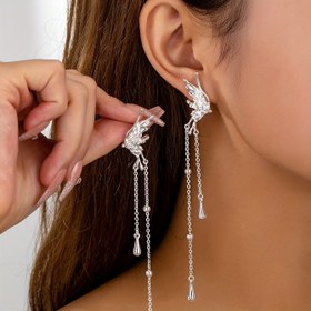 Resim Lüks Melek Kanadı Küpe Kadınlar için – Seksüel Çinko Alaşım Uzun Zincir Sallantı Studs, Kaplama Yok – Günlük ve Parti Occasions için Moda Elegant Mücevherat, Kaplama Yok Demir Küpe İğnesi – Tüm Mevsim Orta Doğu Koleksiyonu 