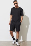 Resim AC&Co / Altınyıldız Classics Erkek Siyah Standart Fit Normal Kesim Örme Spor Şort 