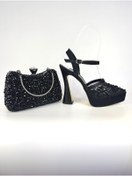 Resim E&L Company 15cm Siyah dantel ve inci işlemeli Çantası dahildir. 