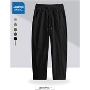 Resim JNBY'den İlkbahar ve Yaz için Yeni Nefes Alabilen ve Çok Yönlü Erkek Pantolonları, Model XD082, Trendy Eğimli Tasarımıyla. 