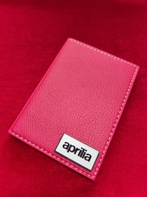 Resim ATTA PAZARLAMA Kabartmalı pleksi kırmızı deri APRILIA Ruhsatlık, Ruhsat Kılıfı, Ruhsat Cüzdanı, Ruhsat Kabı 