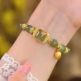 Resim Kadınlar için Narin Lotus Boncuklu Cam Bileklik: Altın Vurgulu Lüks Taş Bileklik 
