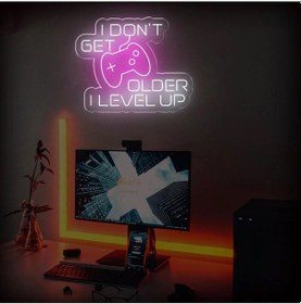 Resim I Don't Get Older I Level Up Yazılı Ve Şekilli Neon Tabela Beyaz 