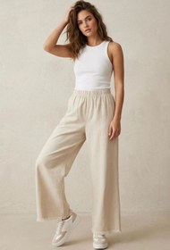 Resim adamila Kadın Bej Beli Lastik Özel Yıkamalı Kumaş Paçaları Püsküllü Geniş Paça Tesettür Pantolon 