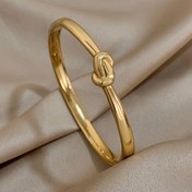 Resim 1 adet Vintage Tarzı Twist Knot Paslanmaz Çelik Bilezik, Parlak Altın Kaplama İnce Bilezik, Kadınlar ve Erkekler için Moda Şanslı Takı, Günlük Giyim ve Partiler için İdeal, Mükemmel Sevgililer Günü Hediyesi, Tüm Mevsimler İçin Mükemmel Aksesuar 