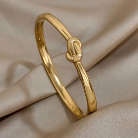 Resim 1 adet Vintage Tarzı Twist Knot Paslanmaz Çelik Bilezik, Parlak Altın Kaplama İnce Bilezik, Kadınlar ve Erkekler için Moda Şanslı Takı, Günlük Giyim ve Partiler için İdeal, Mükemmel Sevgililer Günü Hediyesi, Tüm Mevsimler İçin Mükemmel Aksesuar 