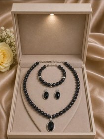 Resim Oval Taş Detaylı Vidalı Siyah İnci 3'lü Kolye Bileklik Ve Küpe Seti 