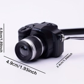 Resim 1 Adet Mini Plastik Kamera Siyah Kayışlı, Bebek Evi Aksesuarı, Ev & Bahçe Dekoru için Mini Süs, fotoğrafçılar için mükemmel küçük hediye, Mini simülasyon aksesuarları, Pil Gerekmez 