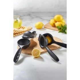 Resim Döküm Paslanmaz Limon Sıkacağı Kaliteli Malzeme El Tipi Pratik Ergonomik Kullanım Şık Tasarım 