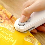 Resim Taşınabilir Atıştırmalık Paketleme Makinesi, USB Şarj Edilebilir El Çantası Paketleme Makinesi, Manyetik Presli, Lityum Pil Güçlü, Ev Kullanımı İçin Kompakt Tasarım 