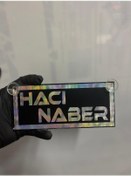 Resim Siyah Renk Üzeri Hologram Renk Hacı Naber Yazılı Vantuzlu Cam Süsü 