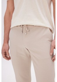 Resim AC&Co / Altınyıldız Classics Erkek Bej Slim Fit Dar Kesim Beli Bağlamalı Yan Cep Gofre Desenli Pantolon Bej 