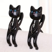 Resim İki Kedi Şeklinde Plaj Havlusu Klipsi, Havlular için Plastik Sandalye Klipsleri, Giysiler, Yorganlar ve Battaniyeler için Sevimli Karikatür Kedi Klipsleri, Yatay Sandalyelerde, Kurutma Rafında 