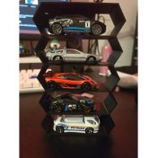 Resim Hot-Wheels Oyuncaklar Için Duvar Garajı 1/64 ölçek uyumlu 5 li modeldir. 