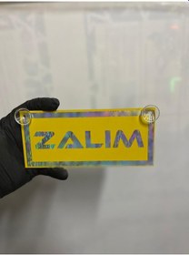 Resim Sarı Renk Üzeri Hologram Renk Zalım Yazılı Vantuzlu Cam Süsü 
