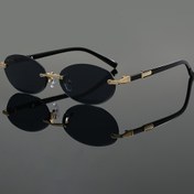Resim Unisex Oval Çerçevesiz Moda Gözlük - Siyah PC Lens ve Altın Detaylı Çerçeve, Geniş Uyum (>139mm), Şık & Dayanıklı Parti, Günlük Kullanım, Dünya Günü, Mezuniyet, Aksesuar, Modern Tasarım, Hafif Yapı, Dekoratif Gözlük, Hediye Seçeneği 