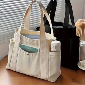 Resim Şık Büyük Tuval Çanta - Fermuarlı Kapanışlı, Dayanıklı Polyester Astarlı ve İş ve Günlük Kullanım İçin Ayarlanabilir Omuz Askıları ile Geniş Çoklu Bölme Tasarımı, Çeşitli Renkler, Çanta, Çok Yönlü Taşıma Çantası, Yapılandırılmış Şekil, Sağlam Tutma Sapları 