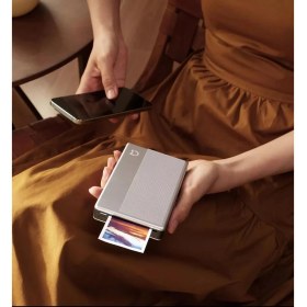 Resim Xiaomi Taşınabilir Fotoğraf Yazıcısı 1s 10 Sayfa Kapasite ile Hafif ve Kullanışlı Gri Renkli 