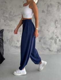 Resim Gugus KADIN MODAL KUMAŞ ŞALVAR TREND MODEL PAÇA VE BEL DETAYLI RAHAT KESİM EŞOFMAN 