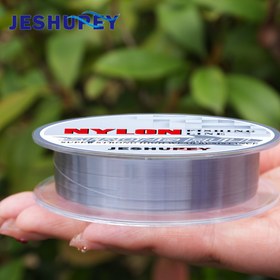 Resim 1 Makara JESHUPEY 100m / 109YD Naylon Olta İpi - Yüksek Mukavemetli Aşınmaya Dayanıklı Monofilament, Tatlısu ve Tuzlu Su Tekne Balıkçılığı için Gri Ana Hat, Tatlısu Balıkçılığı | Makara Tasarımı | Esnek Naylon Malzeme, JESHUPEY 