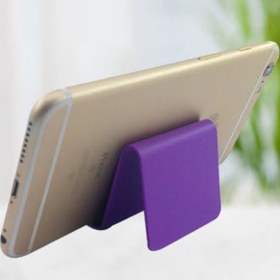 Resim Taşınabilir ve basit bir telefon standı, masaüstü için tembel insanlara küçük bir hediye olarak mükemmel. 