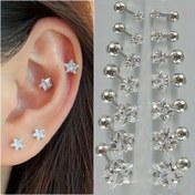 Resim Kadınlar için çekici bir çift Clow Yıldızı berrak zirkonya kulak çivisi paslanmaz çelik kulak kıkırdağı tragus piercing takı helix çivisi küpe 