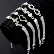 Resim 4 adet şık ve lüks su taşlı kalp kelebek 8 karakterli sonsuzluk sembolü ayak bilekliği seti, kadınlar için günlük tatil ve plaj partileri için ideal. Kadınların doğum günü ve Sevgililer Günü'nde harika bir hediye 