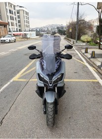 Resim Motocam Sym Adx 300 Siperlik Ön Cam 2024-2025 Model 65cm Açıkfüme Renkli 4mm Orta Boylu Cam 