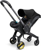 Resim Doona i Bebek Arabasına Dönüşen Tekerlekli Gr 0 i-Size Ana Kucağı Oto Koltuğu - Nitro Black 