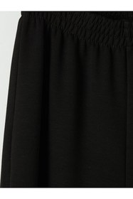 Resim LC Waikiki UZG STORE'dan Stil Sahiplerine Kız Çocuk Geniş Paça Soft Touch Eşofman Altı 