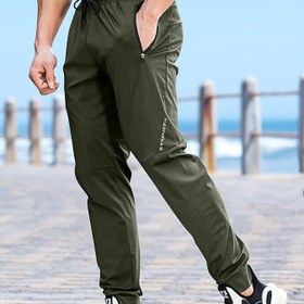 Resim Erkekler için Elastik Bel ve Manşetli Ayak Bileği - Koyu Yeşil Tam Fermuarlı, Nemi Emici Koşu, Spor Salonu & Günlük Kullanım İçin Şık Atletik Jogger Pantolon 