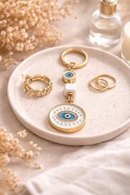 Resim Gold Nazar Boncuklu Anahtarlık - Beyaz Mine & Altın Kaplama Modern Şans Tılsımı - Çanta ve Araba Anahtarı İçin Unisex Premium Tasarım 