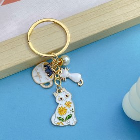 Resim 1 adet Çinko Alaşım Antika Gümüş Yaratıcı Moda ve Minimalist Tarz Damlama Çay Bardağı Kedi Anahtarlık, En İyi Okul Moda Aksesuarları, Cadılar Bayramı Noel Moda Aksesuarları 