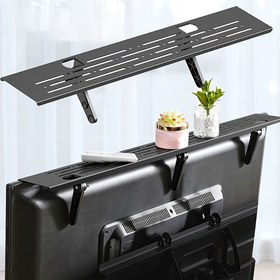 Resim TV'nin Üstü İçin Kolayca Kurulum Yapılabilen Delinmeden Kullanılabilen Bir Depolama Rafı, TV Kutuları ve Bilgisayar Monitörleri İçin Uygun. Bu Üst Depolama Rafı Ekranları Yönetmede Yardımcı Olur ve Ev Ofis Kurulumları, Router'lar ve Monitör Standları İçin İdealdir, İç Mekan Alanı Tasarrufu Sağlayan ve Şık Bir Organizasyon İçin Mükemmel Bir Seçenektir. 