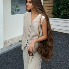 Resim Kadınlar için Kore tarzı rahat şık iki parçalı takım - Kolsuz V-yaka üst ve geniş paça pantolon, polyester karışımı, bahar/yaz koleksiyonu 