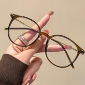 Resim Non- Glasses - Clear Lens Vintage Style, Simple Round Frame in Brown Tones, Daily ve Formal Durumlar için Uygun - Unisex Küçük Yuvarlak Gözlük, Moda Aksesuarı, Klasik Tasarım, Dayanıklı Malzeme, Trendy Ürün 