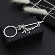 Resim Eski tarz ok ve yay tasarımı, rahat tarzda şirin anahtarlık, geometrik yaratıcı aksesuar, hediye için ideal seçenek 