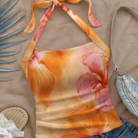Resim Kadınların Çiçek Desenli Halter Üstü | Canlı Turuncu ve Pembe Çiçek Deseni | Kolsuz, Bağcıklı Yaka | Hafif Polyester | Yaz Plajı ve Tatil Giyimi 