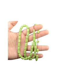Resim Sistem Püsküllü 11x7 Mm İmzalı Sıkma Kehribar Tesbih 
