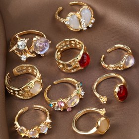 Resim Bir set vintage punk minimalist şık kişilik yıldız patlaması çiçek tomurcuk bling bling bölünmüş açık halkalar, kadınlar için mükemmel tarihler, toplantılar, partiler, banketler, tatiller, günlük kıyafetler ve yıldönümü hediyeleri için harika bir seçim. 