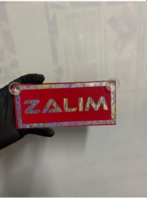 Resim Kırmızı Renk Üzeri Hologram Renk Zalım Yazılı Vantuzlu Cam Süsü 