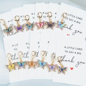 Resim 12 Parça Kelebek Anahtarlık Seti – Teşekkür Temalı Cep Sarılma Hediye Paketi: Bozuk Para Çantası, Şapka ve Araçlar işinize Özel Takdir Ve Dostlulk İbreti. Minnettlik hediyesi ile öne süren bir hatira (Teğet Partisi Süslemeler/Nişan Ziyafesi, Nikah Davutu Egitim Okulu Geridönüş). En Iyi Cadılar Bayrami, Ýylbaşy Arkadaş ýaňlygy, Ýaşayış Söhbetlerini Bezegleme Üstünligine. Dayamli Kilit Halqasy 