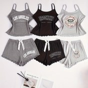 Resim Üzerlerinde sloganlar basılmış yuvarlak yaka kolsuz üst ve şort pijama setleri 