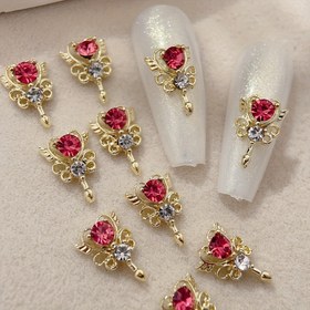 Resim 10 Adet Alaşımlı Taşlı Sihirli Değnek Süsleri - Pembe Taşlar ve Ayrıntılı Altın Tonlu Kalp Şekilli Tırnak Sanatı Takısı, DIY El İşleri, Telefon Kılıf Dekoru, Zarif Aksesuarlar, Takı Yapımı için Süsler, Yaratıcı Süslemeler, Şık Detaylar, Yaratıcı Dekorasyon 