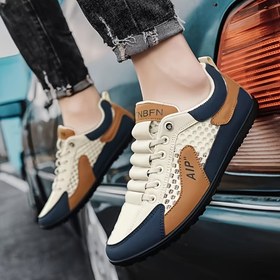 Resim Erkekler için Nefes Alabilir Orta Boy Sneakerlar - Kaymaz Kauçuk Taban, Dayanıklı Yumuşak Alt, Koyu Mavi & Turuncu Üst ve Beyaz Dikişli Geometrik Tasarım, PU/Kumaş Malzeme, Dış Aktiviteler için Bağcıklı Kapama 