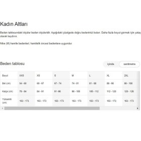 Resim Nike Sportswear Regular Fit Pant Bol ve Uzun Kesim Eşofman Altı Kırık Beyaz 